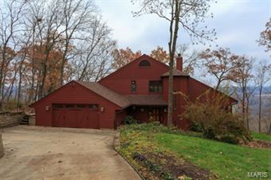 Breathtaking views off this stunning home privately located on a 1.3-acre lot! The back deck faces east, so you will see the sun rise over miles of picture-perfect farmland. Inside, find 5 bedrooms, 3.5 baths & three levels of well-appointed living space. The great room features a stone fireplace, vaulted wood ceiling, floor to ceiling windows, and opens to the rest of the home. Updated kitchen, renovated bathrooms, a master suite, sauna, and a 2 car garage with race deck flooring. Don't miss the gleaming hardwood floors, soaring vaulted ceilings, oversized balcony with unbeatable views, and in-ground sprinkler system. Updates include: New roof, maintenance free concrete fiber siding, leaf guard gutters  (2017) and street side parking & railed walkway (2015). Don't miss this rare gem -- properties this special don't come on the market very often!