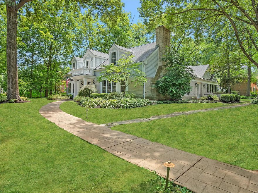 Fabulous New Price Adjustment!!! Move in ready! A timeless Cape Cod style home in a spectacular Frontenac location nestled on a park like .74 acre corner lot across the street from Villa Duchesne and Oak Hill School. Step into gracious living greeted by a grand staircase and custom millwork floor to ceiling. New dark oak engineered hardwood flooring throughout main level and updated elegant lighting throughout. Main floor oversized master suite with his and her closets and complimented by a spa-like marble master bathroom. Large custom kitchen with center island provides lots of space for entertaining. Family room with vaulted ceiling with newly added wood beams and a tiered oversized chandelier. Upstairs you will find 3 additional bedrooms and 2 full baths with a secret bonus room. This is a home for today's lifestyle. Live, work, play.