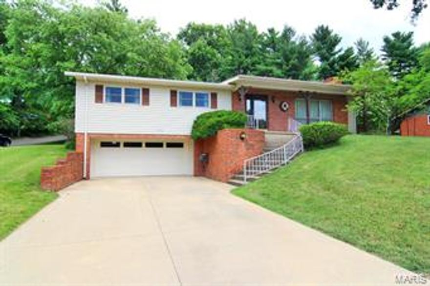 This well maintained raised ranch is situated on a shaded corner lot in an established neighborhood with over 1550 square feet on main level and additional in the lower level.  This is a three bedroom, 1 3/4 bath home with a bath plumbed in the lower level, formal dining, breakfast room and more.  There are two living areas, both with fireplaces also.  Make sure to see this nice home!
