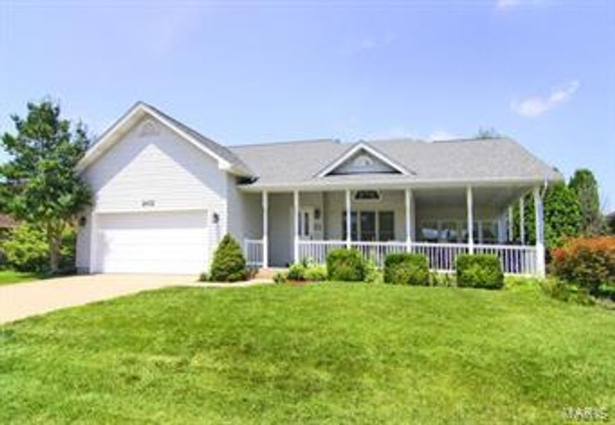Unique 1.5 story home in a family friendly neighborhood within Schrader school district.  Soaring ceilings as you enter, nice bright kitchen with corian, back patio and awesome wrap around porch for lounging, new carpet throughout and new roof.  Main level master suite and bonus extra family room/sun room on main level adds extra living space!!  Laundry hook-ups on the main level and basement level.  Extra finished space in the basement perfect for play room, office, or den.  Lot's of extra storage, just off Lexington close to everything!