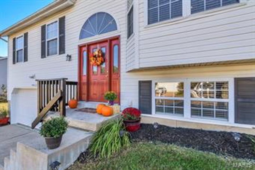 BACK ON MARKET AT NO FAULT OF SELLERS- Welcome home to this lovely 3BR, 2 full bath split foyer home. Only one owner since built and beautifully kept. The newer front door with palladium window will catch your eye immediately at first glance and as you walk into the main level, the home is lit with natural light. The open floor plan, vaulted ceilings & bay window help add space to the living area, which includes wood burning fireplace with custom mantle. Kitchen has been updated with ceramic tile flooring. The lower level includes large, finished family room with newer veneer floors, and is the perfect place to unwind or entertain. Lower level also includes laundry and utility room & entrance through the spacious, 2-car garage. The sizable, white vinyl fenced yard has a large patio for you to enjoy the outdoors. New roof 2017, new carpet June 2018. Passed municipal occupancy. Offering a 12 month home warranty with American Home Shield. You won't want to miss this great home!