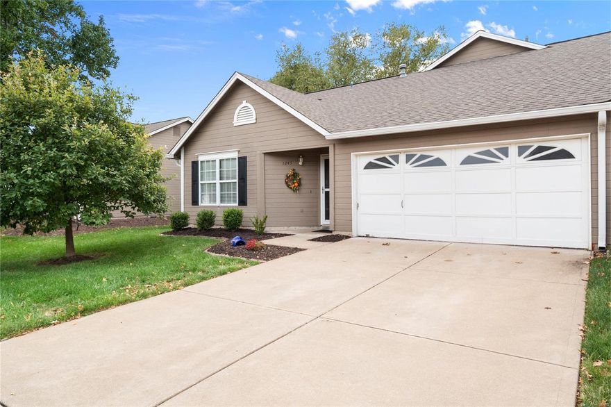 From the moment you arrive at this gorgeous lake front villa, you are sure to be impressed! Enjoy stunning lake views from many rooms throughout this sprawling end-unit w/a 2 car garage. The spacious eat-in kitchen overlooks the great room with gorgeous updated flooring ('19) & a wood burning fireplace flanked by a large window & sliding glass door ('21) bringing in plenty of natural light! The main floor is complete w/a bedroom, full bath & laundry room! Upstairs hosts the vaulted master bedroom w/his & her double closets, updated carpeting ('19) & an updated 2nd bath! Plenty of room to relax & soak in the water views from the large aggregate patio out back. Don't miss the fantastic subdivision amenities, including a pool, club house, tennis courts, walking trails & low maintenance lifestyle w/lawn maintenance, snow removal & more handled by the HOA! Located just minutes from Hwy 364 w/easy access to shops & restaurants, you won't want to miss this incredible home! Water heater - 2020 Location: End Unit, Ground Level, Suburban