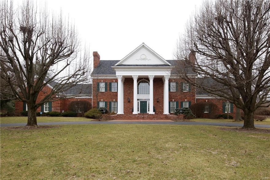 SIMPLE ELEGANCE! GRACIOUS TRADITONAL BRICK sits on PRIVATE ACRE at end of CUL-DE-SAC. This house is impressive from the first moment you enter. Tall ceilings thruout, (10' - 1st flr, some taller w/tray or vaulted ceilings, 9' - 2nd flr) 8' six-paneled doors, floor to ceiling windows, extensive millwork, 5 frpls, plantation shutters, 2 wet bars - just a few of the amenities. Large 2 sty entry has circular stairway, arched openings to LR & DR, marble floor. Step to beautifully paneled Great Rm w/a wall of windows overlooking patio, pool & decking. Enjoy frpl, wet bar & adjacent sunrm w/3 walls of windows that steps out to pool area. Handsome paneled library, also off Great Rm has bay window, blt-in cabinetry/shelves & leads to the 1st flr Master Suite. Additional 3 bdrms on 2nd flr enjoy their own baths. Loft space has blt-in cabinetry/shelves. Kit w/back stairway, has island, desk, many windows & opens to brkfst area. Fin W/O LL w/frpl, dance rm & sauna. 4 car gar. ENTERTAINER FRIENDLY! Additional Rooms: Sun Room