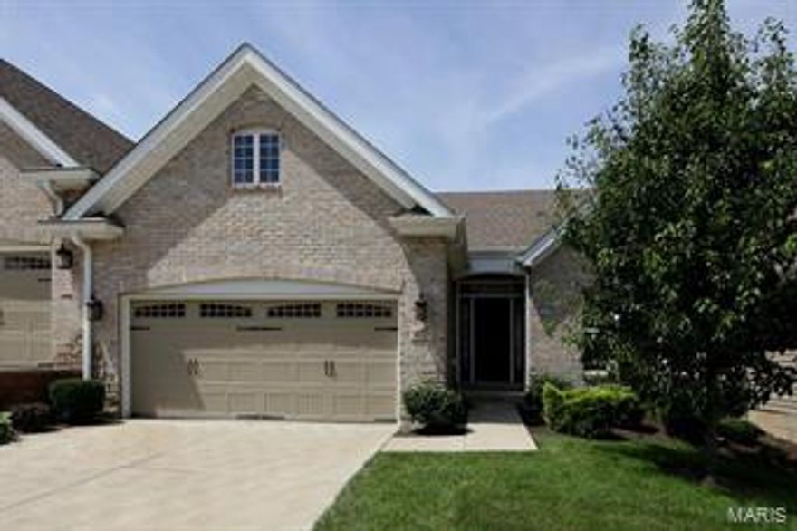 Exceptional 1-sty brick villa in upscale community! Open floor plan designed for easy living & entertaining. Inviting covered front porch entrance leads to gracious entry foyer, vaulted great room with marble fireplace flanked by full-height windows and adjacent dining room with bay window & atrium door that walks out to private deck. The kitchen is a chef’s delight with granite countertops, 42” glazed cabinetry, premium appliances & center island with breakfast bar. Fabulous master bedroom suite with bay window, huge walk-in closet & luxury bath offers an appealing retreat. A large 2nd bedroom, hall full bath & convenient laundry room complete the main floor living quarters. Walk-out Lower Level includes recreation room with wet bar & sliding glass door to patio, 3rd bedroom & full bath. Situated on a professionally landscaped lot with deck, patio & 2-car garage. Convenient Chesterfield location just minutes away from Faust Park, shopping & restaurants with easy access to Katie Trail. Location: End Unit