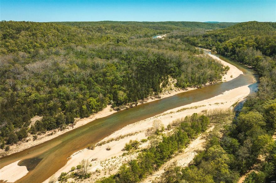 205.6 m/l acre resort w/ nearly 1 mile of pristine river frontage, offering exceptional floating and fishing opportunities. Nestled in a stunning park-like setting, this property boasts 117 camp sites, with 82 sites equipped with water and electric, while the remaining sites offer a primitive camping experience. As you explore the property, you'll discover a full store that stocks all your camping essentials, including buses and canoes for rent. Additionally, you'll find early 1900s log cabins that add a rustic charm to your stay. For larger groups, there's a spacious lodge with a commercial kitchen, a large dining room, and a bar, perfect for hosting events or family gatherings. When it's time to relax, take a dip in the in-ground pool, or challenge your friends and family to a game of mini-golf .With 25 buildings in total, with bedrooms that can sleep over 30+ people comfortably.