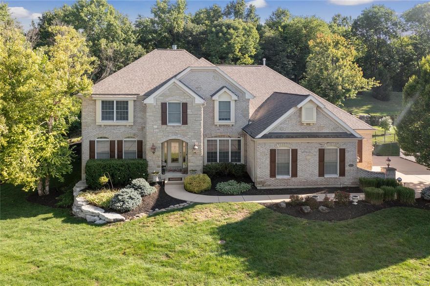 WELCOME to The Manors at Tapawingo! This location is a premium lot nestled between the Tapawingo golf course and common ground. This move-in ready, story and a half home with main floor master is loaded with upgrades when built in 2003. Custom millwork, coffered ceilings, fluted moldings, columns, archways and built-in bookcases are a few. The open floor plan has a gourmet kitchen with upgraded professional appliances, a great room with one-half story ceiling, and an adjoining hearth room with windows on all sides, ideal for entertaining. The landscaped, secluded back yard includes a saltwater vinyl covered pool that can be accessed several ways from the home. There is a designated pool bath. There is a new rec room, with an adjacent ½ bathroom, and a big storage area. The 3-car garage is oversized, HVAC is zoned and there are two 50-gallon water heaters. Not being by the main golf entrance keeps the street quiet but still close enough to enjoy all the amenities of the course. COOL: 14 SEER+