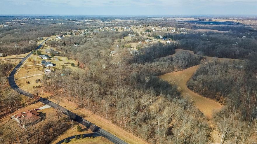 Fantastic 3+ acre development opportunity in the O'Fallon/St. Paul area.  Property sits in a rapidly growing area right between $500k and million houses.  Located less than 5 minutes off of Highway 70.  Good mix of open and wooded ground to develop into residental lots that back to the woods.  Sale is subject to owner harvesting the crop at the end of the season.