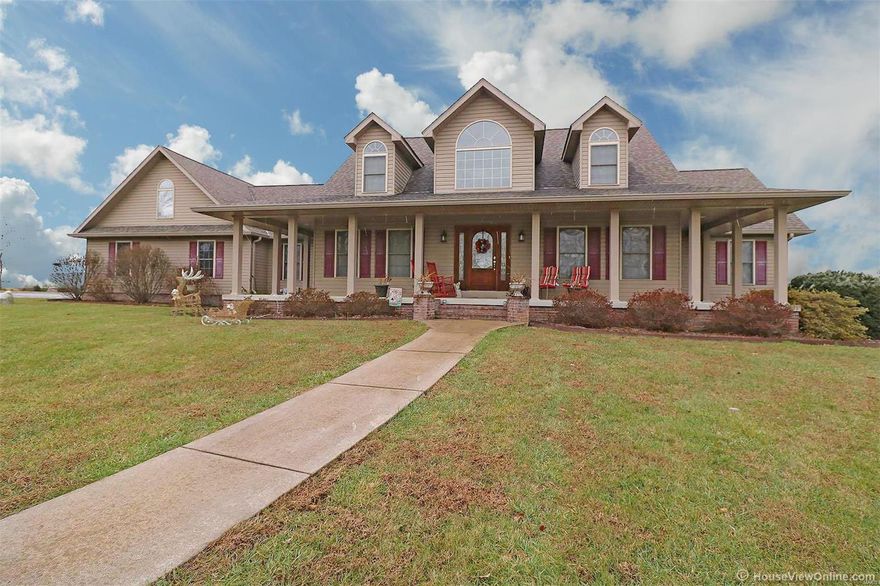 Lovely 1 ½ Story home with over 2700 sq ft on the main level.  Amazing covered front porch, 2 story entry, vaulted living room ceiling & fireplace. Main floor master bedroom with ensuite.  Two bedrooms upstairs each with their own full bath.  Full finished basement with bar area walks out to large patio.  Home backs up to the 2nd & 3rd hole of the St. Francois County Golf Course and sits on 3 acres ml/l in Bogey Creek Subdivision .  3 car attached garage too!