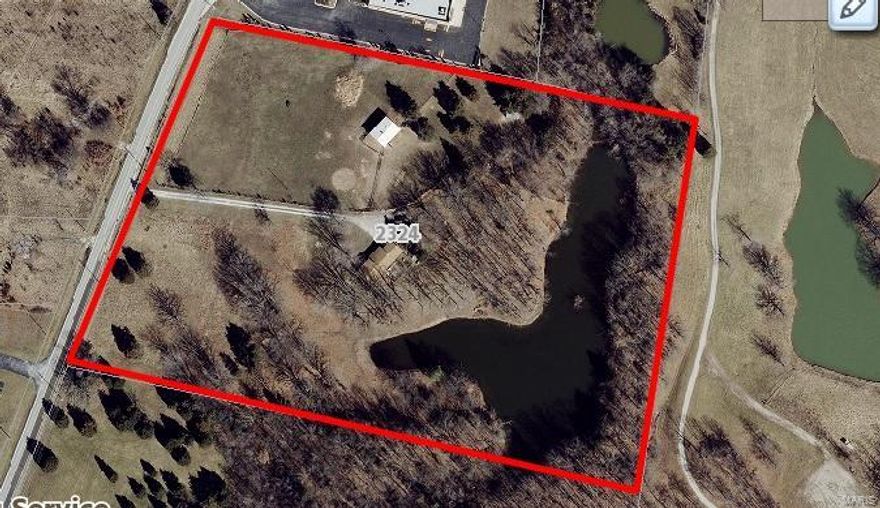 Great parcel for bank, office or outside storage. Location: High Traffic, Rural