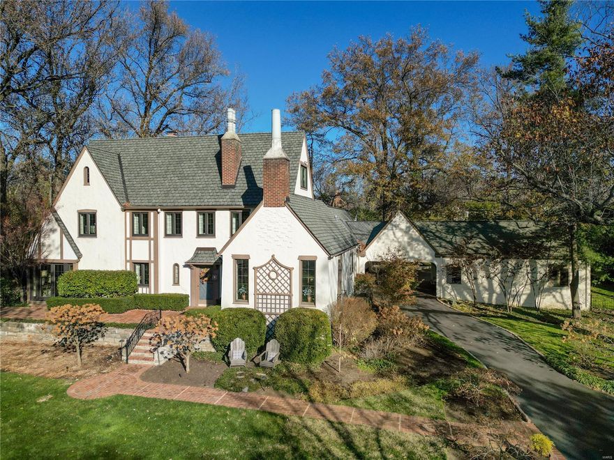 Quintessential Ladue home nestled on 1.8 acres in sought after Picardy Lane. This 5,440+ sq ft, 5 bed, 4 full & 2 half baths home exudes classic finishes and one-of-a-kind architectural details highlighting indoor and outdoor living.  Gorgeous formal living and dining rooms walk out to private patios and feature detailed custom fireplaces. The gracious open kitchen with center island opens to the family room w/ wet bar, fireplace, and steps to a private courtyard under mature tree canopy and adjacent to gorgeous pool/patio. The main floor master suite with updated luxury bath is the perfect respite after a long day. A laundry room, Butler’s pantry area, and guest powder complete the 1st floor.  Two bedroom suites and 2 additional bedrooms that share a beautiful bath complete the spacious 2nd floor.  The finished 3rd floor is perfect for rec space/office space & offers a half bath.  The updates throughout this home enhance this exquisite one-of-a-kind home.  Walk to Ladue schools/shops.