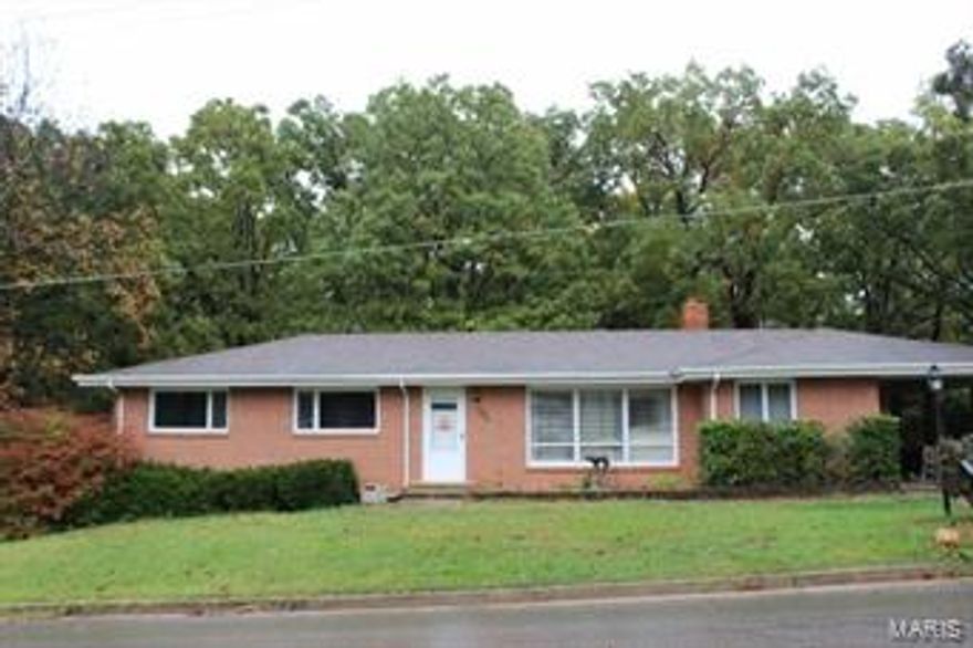 An abundance of living space in this 3 Bedroom home on a full partly finished basement located at the end of a cull-d-sac.  Home is brick on 2 sides, has an oversized 1 car garage in the basement and a carport off the side entrance.  Nice Kitchen, breakfast/ mud room/Hearth area with fire place as you enter from the side.  Family room downstairs is very large plus there is a play room which has been used as a fourth bedroom in the past.  Located on 1 1/2 lots that allows plenty of play space plus a great deck.