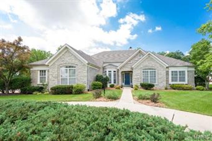 Beautiful Ranch situated on a cul de sac lot that backs to trees for privacy in a desirable neighborhood.  This home welcomes you with a Spacious floor plan , hardwood floors and custom molding.  The Great Room has high ceilings with an attractive wall of windows, gas fireplace, and built in bookcases.  Gorgeous large Kitchen with 42" cabinets, granite counters, and breakfasts island.  Kitchen leads out to the three season room perfect for outdoor entertaining or relaxing.  Open formal Dinning Room and  Den/Office with french doors. 4 Bedrooms each with private bath and walk-in closets.  Main floor Master Bedroom has 2 large walk-in closets, Master Bath has his/hers vanities and jet tub. Finished lower level with lookout windows features a Family Room and Rec area.  Possible 5th sleeping or office area with a walk-in closet. Other features include dual HVAC, circle drive, side entry 3 car garage, large main-floor laundry,and lower level patio.  Full Lake Rights!