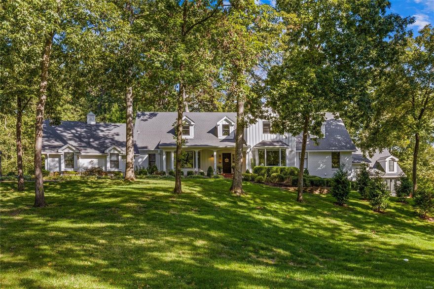 Spectacular 1.5 sty Country Estate home on 3+ scenic acres! Over 6600 sf of living space enhanced by superb architectural finishes throughout. 2-Sty foyer opens to elegant living room with wide bay window, generously sized dining room & stunning great room showcasing cathedral vaulted ceiling with cedar exposed beams & trusses, brick fireplace & full height windows with unsurpassed views. Spacious open kitchen with white cabinetry, granite countertops, premium appliances, designer range hood & center island adjoins light-filled breakfast room with access to veranda. Primary bedroom suite & luxury bath, 2nd bedroom & solarium with shiplap ceiling complete the main floor living quarters. Front staircase access 4 additional bedrooms & 2 baths. Outstanding walk-out Lower Level includes recreation room with fireplace & fitness room. Extensively landscaped lot featuring beautiful outdoor living space with pool, veranda & 3-car garage. Central location w/ easy access to HWY 40/64 Additional Rooms: Sun Room