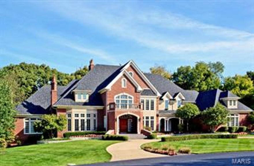 Dreams really do come true!!  Once in a lifetime opportunity to purchase this custom 1-1/2 story exquisite 10,800+sf home situated on a private wooded lot backing to Hunter Farms.  Designed by Dick Bush and built by DeShetler, this showplace is loaded with high end detail ceiling treatments, custom millwork and luxurious features found in very few homes.  The first floor boasts minimum 10' ceilings, open floor plan, grand 2 story entry with oversized staircase, great room with built in bookcases & volume ceiling,  gourmet kitchen, hearth room with gorgeous window wall & oversized sit down bar, richly paneled library, master bedroom retreat with his and her baths, fireplace, and sitting room.  The finished lower level includes huge recreation room complete with bar and kitchen, game room, state of the art media room, wine cellar with humidor, exercise room, his and her pool baths.  Rear yard has pool and spa, outdoor kitchen, 2 decks, 2 patios, screened porch set in trees.