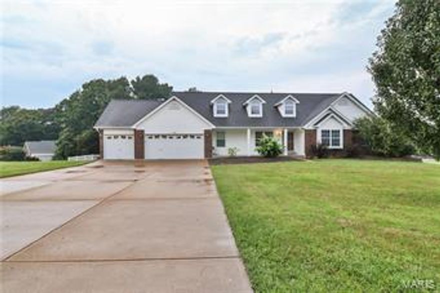 Absolutely stunning 4 bdrm, 3 bth atrium ranch with full finished lower level and 3 car garage on just under 1 acre! Major curb appeal! Beautiful front elevation with steep roof pitches make this home look massive. Huge level usable lot, awesome private playground out back and a large level driveway perfect for basketball court. True dream home with gleaming wood floors, soaring vaulted ceilings, beautiful brick hearth wood burning fireplace, solid surface kitchen countertops w/ integral sink, stainless steel kitchen appliances, relaxing covered deck off breakfast room overlooking the playground, luxury master bdrm/bth suite w/ whirlpool tub, gorgeous custom built atrium staircase to huge finished lower level complete w/ wet bar! Oversize 3 car garage with drop down stair case to attic storage. If you need additional garage/storage space there is room to spread out on this lot! Seller is offering a 13 month home warranty protection policy for additional piece of mind. Come see it now!