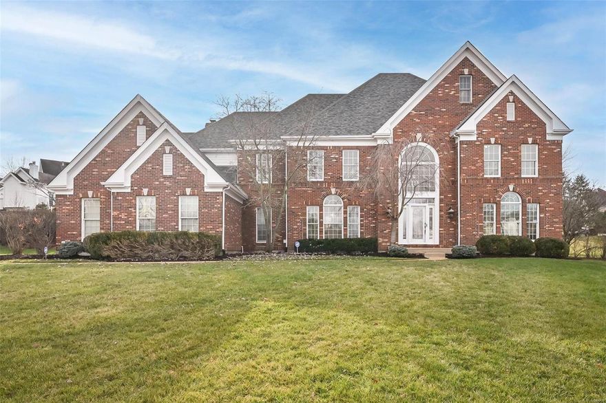 This classic-styled brick 2 Sty features distinctive design elements & extensive updates both inside & out including oak hardwoods, freshly painted interiors & contemporary lighting plus architectural roof, newer A/C & improved insulation. Impressive 2-sty entry foyer leads to formal living & dining rooms with Palladian windows & detailed trim work and library-paneled family room with wide bay window, wet bay & brick fireplace flanked by built-in bookcases. Designer kitchen with 42" white cabinetry, granite countertops, KitchenAid appliances, center island & butler's pantry adjoins light-filled breakfast room with convenient planning center & vaulted hearth room with brick fireplace & atrium doors that open to screened porch. T-staircase accesses coffered primary bedroom suite with luxury bath with jetted tub & adjacent sitting room and 3 additional bedrooms, 1 with ensuite bath & 2 with Jack n' Jill bath. Lower Level includes recreation room with wet bar, game room, office & 1/2 bath. Additional Rooms: Sun Room