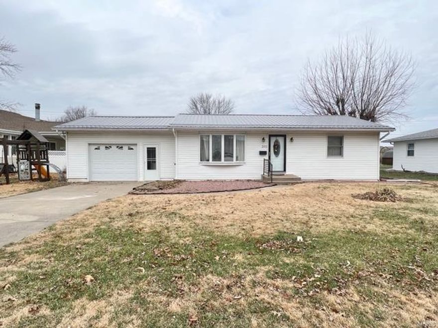 2 Bedroom 1 bath home on level lot in a great neighborhood. This property has a 1 car attached garage and an additional 2 car detached garage measuring 24x30.  Spacious Living Room with Bay Window and coat closet.  Large Kitchen with Gas stove. 2 Main Level Bedrooms and Full Bath with Tub/Shower Combo.   Full unfinished Walk Up basement with finishing potential.   Alley access to the garage.  Conveniently located down the street from County Market and Ace Hardware. Don't miss your chance at this home.  Call for your appointment today.