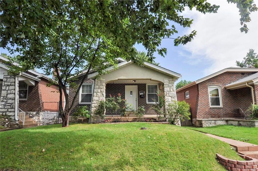 Est. 1923 -Tower Grove South move-in ready bungalow! All the charm you are looking for -brick & stone, faux fireplace mantel, big front porch, arched entryway, crown moldings. Wait until you see the closet in this master bedroom- its a dream for a house in the City! Eat-in kitchen is big, bright & will be where the party congregates! The basement has more areas to turn into living space & a half bath - space for a family room & an office/gym. The backyard has a small patio, garden or flower beds just waiting for your touch. There is a 1 car garage port (from the alley looks like a garage but from the yard its open). *New Roof 8/2016 * Now let's talk about location! Tower Grove South :) You wouldn't have to cook for a week, heck a month -Friendly's, The Dam, Black Thorn, Tower Pub & so much more. Did we mention how close you would be to Grand Ave? Cool cafés, bars, shops & services you won’t find anywhere else in the St. Louis metro area. Close by Tower Grove Park & the Farmer's Market.