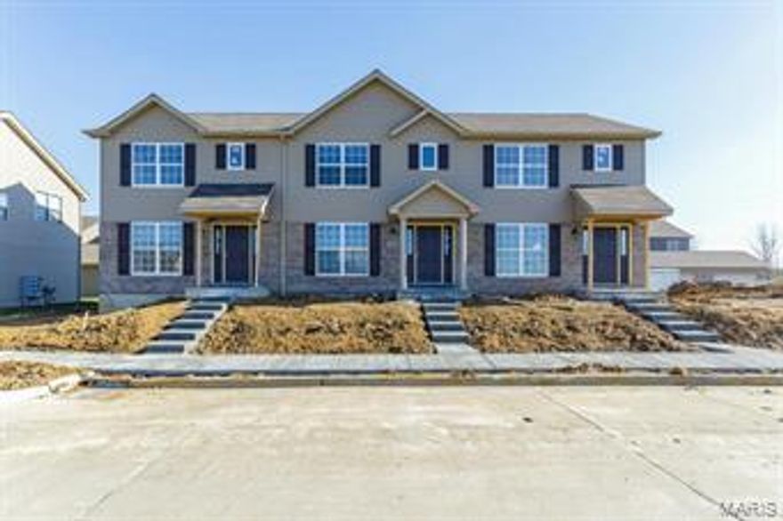 Brand new 2 or 3 bedroom townhouses w/2 CAR GARAGES under construction and available soon in desirable Queensbrooke in St. Peters! Fabulous location with easy access to almost anywhere with Highways 364, 94 & 70! Quarry Tile entry and wood laminate in Family Room! Large Breakfast area and spacious kitchen w/center island, pantry, all wood cabinets, built in microwave, stove & dishwasher. Upper level laundry is an awesome feature as well! Master suite has it's own private bath, plus addl full bath on upper level for other bdrms. Guest bath on main level. Ceiling fans in all bedrooms and Family Room. Rough in for bath in lower level. 2 car garage w/opener. 4 units currently under construction - Buyer may be able to customize - Call listing agent for details!  Additional units to be built; these are pictures of similar style townhouses in complex. Location: End Unit, Ground Level