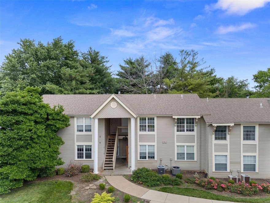 Step into comfort and convenience with this charming ground-level condo with a partially finished basement. Nestled in a serene neighborhood, this 2-bedroom, 2-bathroom home is located right off of highway 364. Enjoy the ease of ground-level living, providing seamless access to your home without the hassle of stairs. Perfect for individuals of all ages. Embrace the airy and inviting atmosphere of the open-concept layout, ideal for entertaining friends and family or simply enjoying everyday living. Located right off the living room is a private patio that backs to trees. Main floor laundry is located right off of the kitchen for your convenience. Head down to the basement where you will find an additional living space and plenty of storage! Schedule your showing today! Location: Ground Level