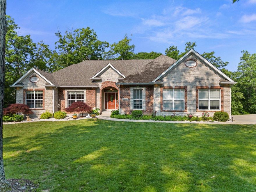 Stunning 4 BD 3.5BA hm on 3 wooded acres just 4 mi from I-70. A custom home featuring 9ft ceilings thru-out & 9ft pour, Great RM w/reverse vault ceiling, gas frpl, built-ins, open oak staircase w/wrought iron spindles & spectacular view out the floor to ceiling atrium windows. Kit w/LG center island, granite countertops, 42 custom wood cabinets (staggered w/crown), vaulted ceilings & plant shelves, Hearth rm w/crown & stone wood burning frpl & walks out to Lg deck, MAIN FLOOR LAUNDRY L w/cstm cabinets, dining rm w/custom wains coating, chair railing & bay, Owner suite w/French doors, bay windows, coffered ceiling w/crown & lighting, ensuite lux bath w/walk-in closet, garden tub, adult height sinks, shower w/seat & rain shower. LL w/rec room, wet bar, customizable shelving, family rm, 1 possibly 2 bedrooms (1 is technically an office), full bath and walks out to a 60x15 +/- patio, 2 car side entry 30x24 & detached 32x24-3 car garage w/220amp electric, mature landscaping. So many extras Additional Rooms: Mud Room