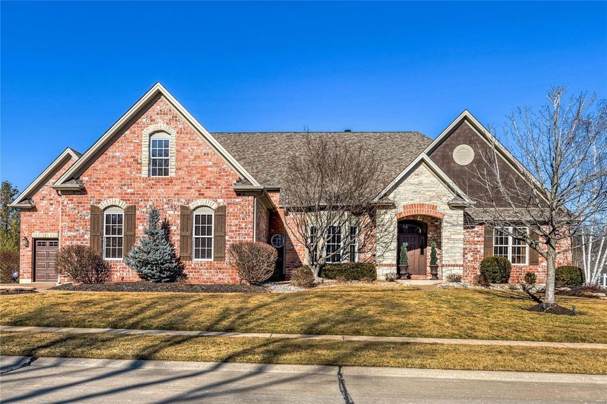 Beautifully designed brick & stone ranch home from award-winning builder Arbor Homes. Split floor plan features wide plank hickory flooring, extensive millwork & 11' ceilings. Impressive hardwood foyer opens to sophisticated dining room with tray ceiling & stunning great room with see-through fireplace & wall of windows with private wooded views. Designer kitchen with custom cabinetry, granite countertops & professional grade appliances adjoins light-filled breakfast room with sliding door to screened porch & hearth room highlighted by stone fireplace. Spacious master bedroom suite with luxury bath with walk-in shower offers a relaxing retreat. 2 Additional bedrooms with Jack n’ Jill bath complete the main floor living quarters. Rear staircase accesses bonus room, study & full bath. Lower Level includes recreation room with granite bar, game room, media room & fitness studio plus sleeping area & full bath. Situated on an extensively landscaped .5-acre lot with pool & 3-car garage.