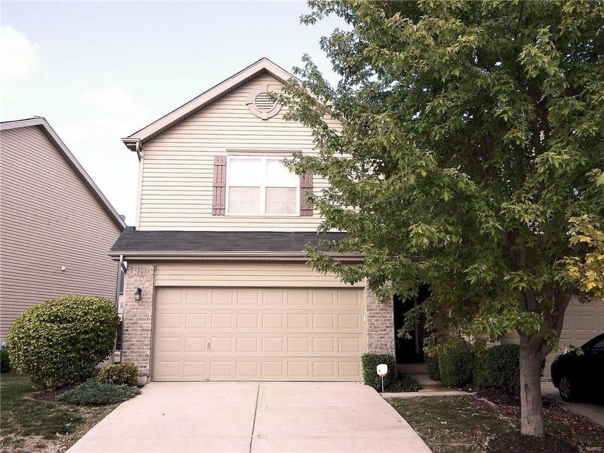 Gorgeous Townhouse Was A Former Display And Has All The Bells And Whistles You Are Looking For!! Beautiful wood flooring flows from entry foyer to large great room with gas fireplace! The kitchen and breakfast room have tile flooring with a bay walkout in breakfast room to nice size deck and back yard! The kitchen has lovely custom cabinets, solid surface counters, stainless appliances and panty! Large master bedroom upstairs has walk in closet and private luxury bath with oversized garden tub, separate shower and double sink! Two other nice size bedrooms, full bath and laundry room also on upper level! The lower level has a finished family room with 9 ft ceilings, half bath and lots of storage space! All appliances are included including washer & dryer! Other features include 2 car garage with opener and security system! Great location just a minute from Hwy 40 and the Page Extension! Location: End Unit