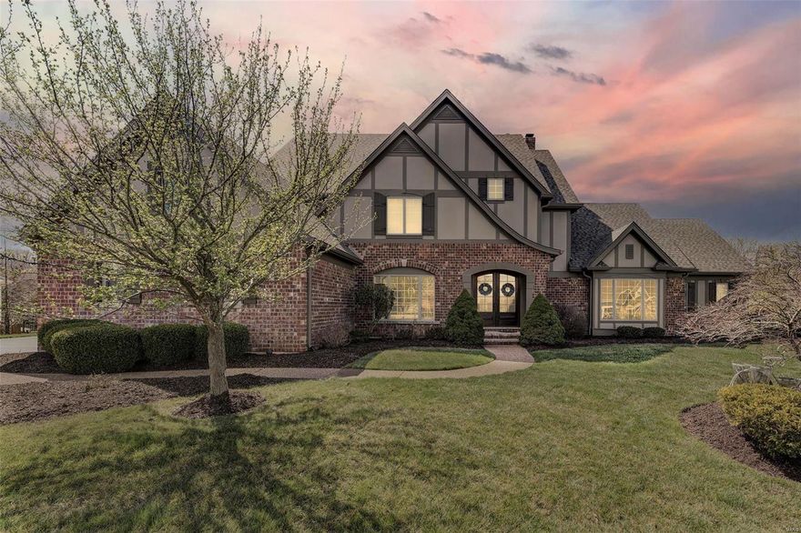 Treat your family to this gorgeous home - shows like a new display. Thru handsome double-doors you'll find a spacious center-hall design that shows so well you may recall Architectural Digest's homes that boast gleaming hardwoods & high ceilings w/large rooms trimmed out from top to bottom, offering beautiful views from nearly every window. Great Room has plush carpeting & stone fpl. In the Dining Room - stone flooring. The Kitchen - 42" wood cabinets w/granite countertops, dbl ovens, center island w/brkfst bar + brkfst rm! Hearth Rm has vaulted & beamed ceiling w/stone fpl, a barrel vault hallway to office, wet bar, laundry & powder rooms. The Master is large & displays a unique coffered beam ceiling + Master Bath has a free-standing modern tub + huge walk-in shower. Bdrms 2 & 3 have Jack-N-Jill bath & bdrm 4 is en suite. LL is attractive w/stone fpl, bar, rec rm, 2 bdrms, 1 bath, game rm, & Home Gym. From the walk-out, thru the trees, you're at the 10th green! Welcome home.