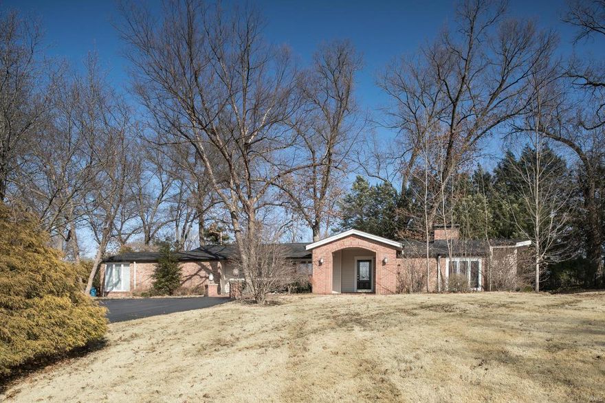 Handsome ranch tastefully renovated and updated 3BR/3.5BA in award winning Ladue School District. The large Great Room features a gas fireplace, high ceilings, and a wall of windows with French doors leading out to a private patio perfect - the perfect spot for AM coffee or an evening cocktail. Updated kitchen with newer granite and stainless appliances with large hearth/sun room over looking private, fenced, inground pool. Large master suite with newer granite bath. Den/movie room with gas fireplace and bar. Other features include side entry two car garage, laundry room, new wood floors and carpet! New full bath off 3rd bedroom. 0.92 acre lot. Very convenient to the best hospitals, schools and shopping that St. Louis has to offer.