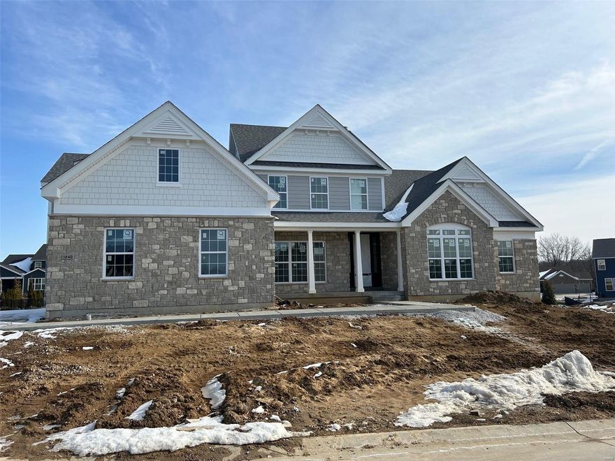 Beautiful open story and a half plan in the Premier Chesterfield community of Fienup Farms. This 5 bedroom and 4.5 bath home boasts a 3 car side entry garage, 9' foundation pour, 9' first floor ceilings with vaults/coffers, covered patio with fireplace, custom cabinetry, Wolf/Sub-Zero Appliances, Quartz countertops, extensive trim work, wood floors, wet bar, great room fireplace and much more.  Available Spring Time Additional Rooms: Sun Room