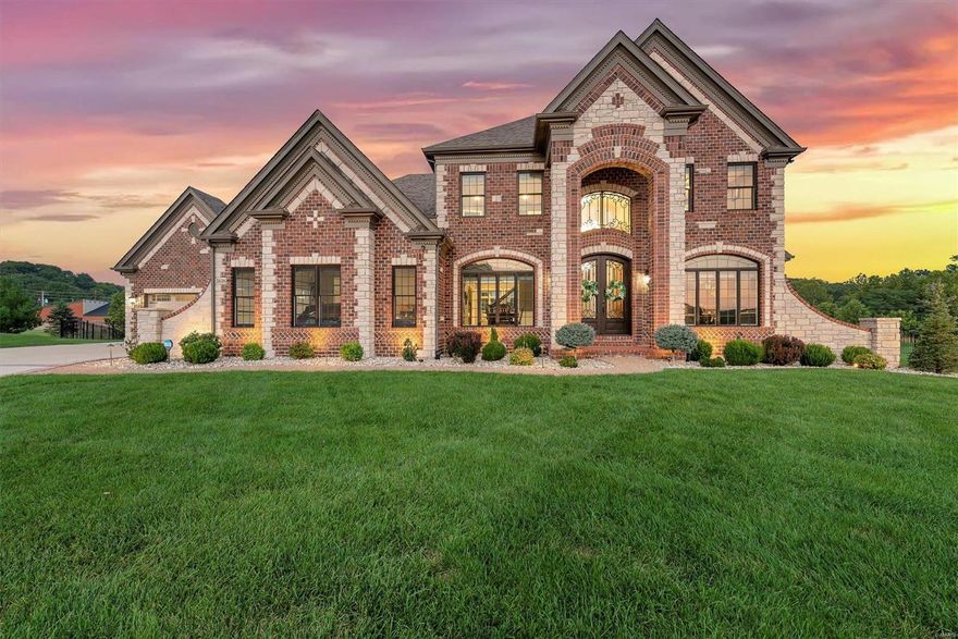 You must see this STUNNING SMART HOME by premier builder, Wesley Byrne.This tech upgraded home features 5 BR, 6 Bth, a whole home integrated control system and over 6000 sq ft of living space. 2-Sty entry foyer leads to an office w/custom built in’s & formal dining area. Entertainer's kitchen features triple stacked granite counters, custom cabinets, Thermador appliances, & center island. Adjacent hearth room for extra entertaining space! 2 story living area flooding with natural light from large picture windows and features a statement gas fireplace with built ins. Main floor master suite with luxury walk in shower & custom closets. Head upstairs to see the bonus room and 3 bedrooms each with ensuite baths & walk in closets. Don't miss the basement with a family room, wet bar, guest bedroom and full bath. Outdoor entertainment area with gas fire-pit and outdoor kitchen. 4 car garage.