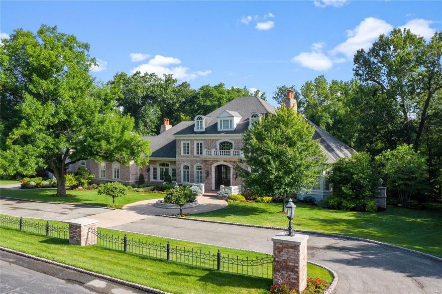 Jaw dropping Ladue estate situated on a plush 3-acre manicured lot with one of a kind features and spectacular spaces. Beautifully constructed 10,000 square feet of living and entertaining space with exquisite yet charming details throughout the home. The main floor offers both grand and cozy well-appointed entertaining spaces, an extraordinary terrace and a beautiful master suite. A sweeping staircase leads to the lower level with plenty of room to refresh, play and entertain with home theatre, work out room, billiard room and tranquil guest suite all leading to the pool, hot tub and patio area. The custom 50 ft. pool and outdoor entertaining spaces are tucked into a park-like setting and are surrounded by expansive travertine terraces, patios and spectacular plantings. No detail was overlooked in this extraordinary home. There are three spacious bedrooms on the second floor, all with their own baths. Finally, there is a roughed in space above the porte cochere. Enjoy the Excellence! Additional Rooms: Mud Room