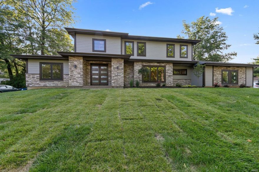 A-M-A-Z-I-N-G!#49 Stoneyside Ln sits on a .46-acre wooded level lot in HIGHLY Desireable Heather Hill Subd. OVER 6400K sqft of FABULOUS Finish on 3 levels!! Walking distance to StacyPark & Old Bonhomme Elem. IDEAL LOCATION! 1.5 story Home features 5 bdrms & 4.5 baths. MainFlr Boasts of MasterSuite (that you may never want to leave)w/ LUXURY 5 piece Bath, complete w/heated floors & towelbar! Gourmet Kit is a "Show Stopper", Waterfall Isl, Kitchenaide App, Solidwood Custom Cabinetry! OPEN Floor plan w/9' ceilings~walk out to covered patio, TV Ready, Endless Entertaining!Upstairs, 3 Spacious bdrms & 2 Full baths + Loft/BonusRm. LL Finished w/approx 2545 sq ft, Includes; Rec Rm, Wetbar, 5th bdrm, & 4th FullBath! 2 More, HomeOffice & Home Gym? Builder is METICULOUS & Amenities are Numerous! Here's a few; Instant Hot H2O thru-out,8 Zoned IrrigationSys, Zoned~HI-Eff HVAC, Main & 2nd flr laundry! Finished garage!! Builder to provide a "finished Mainflr Mudroom" w/accepted contact by Christmas! Additional Rooms: Mud Room COOL: 14 SEER+