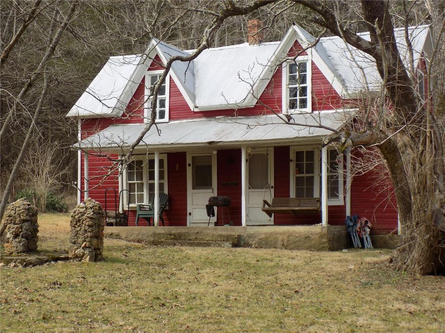 You'll find this 239 acres, is a picturesque place, with a pleasing mixture of cedars and hardwood, and rippling spring water flowing into a pond, next to a hunting cabin, that great for family fishing, and backs up to National Forest . Patience will be properly rewarded with deer and turkey sightings as well as many other forms of wildlife that enjoy their natural habitat in this undisturbed area.  Has about 10 acres on the "Middle Fork of Black River" ideal for family fun.  There is a large metal utility shed, and a second hunting cabin for guests.  This property has been in the same family since 1963 and would lend itself to a hunting club and a family fun retreat.