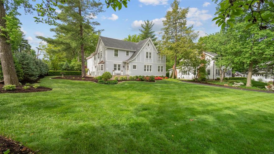 406 Baker is a sophisticated tudor in Webster Groves' Sherwood Forest neighborhood. This luxury home has been remodeled from top to bottom. The main floor has a huge great room/kitchen that overlooks the new pool and built in hot tub. There is also a new full bath that enters off of the pool with washer and dryer. This bath is connected to the office/den. The den/office could be easily converted into a nice main floor bedroom. The main floor also has a large living room and a handsome butler's pantry/bar off of the dining room that rivals most home's kitchens. Plus there is a main floor powder room. The 2nd floor features 2-master suites, both with high end finishes and two other nice sized bedrooms with a hall bath. The basement is partially finished for more entertaining space. The landscaping is immaculate and the house has lots of parking with a front and side driveway and 2-car detached garage. Over 4,400 sqft of space plus the finished basement.