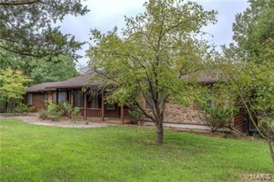 AGGRESSIVE PRICE REDUCTION! Motivated sellers! This very spacious lakefront ranch sits on 3 wooded acres and is tucked off the main road. Ready for your renovations, this home is being sold "as is" without seller repairs. Enjoy quiet privacy and lots of room for outdoor entertaining and viewing an abundance of wildlife. The house is adjacent to a large stocked private pond, part of the property, providing the perfect setting for fishing & relaxing. The home was built in 1985 and has a newer roof and HVAC system. Open eat-in kitchen & hearth room w/custom stone fireplace; the main level also includes two bedrooms, two full baths and a formal living & dining rooms. The walk-out lower level is finished with additional sleeping and recreation space, a wood burning stove for extra coziness in the wintertime along with plenty of storage and a laundry area. A storage shed also sits on the property near the driveway. The home is in the Village of Innsbrook but not a part of Innsbrook Resort. Additional Rooms: Mud Room