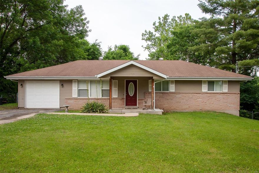 **** BACK ON THE MARKET***NO FAULT OF SELLER ****Move-in ready just needs some updates and TLC.  Dining-room has beautiful beams across the ceiling with recessed lighting. 
This 3 bedroom 1 bath ranch has hardwood throughout main living area.  Fully fenced in back yard includes a shed with coach lights. Extended concrete pad from walkout basement along the back of house. 6 Panel doors. Vinyl windows. Newer Pella Sliding Glass doors in lower level walkout. Newer poured concrete porch for enjoying the cool summer days and nights. Newer concrete walkway. Subdivision has nice fishing lake that homeowners can use. Roads are to be repaired when sewer company is done connecting homes to new sewer line.  This home has already been connected.