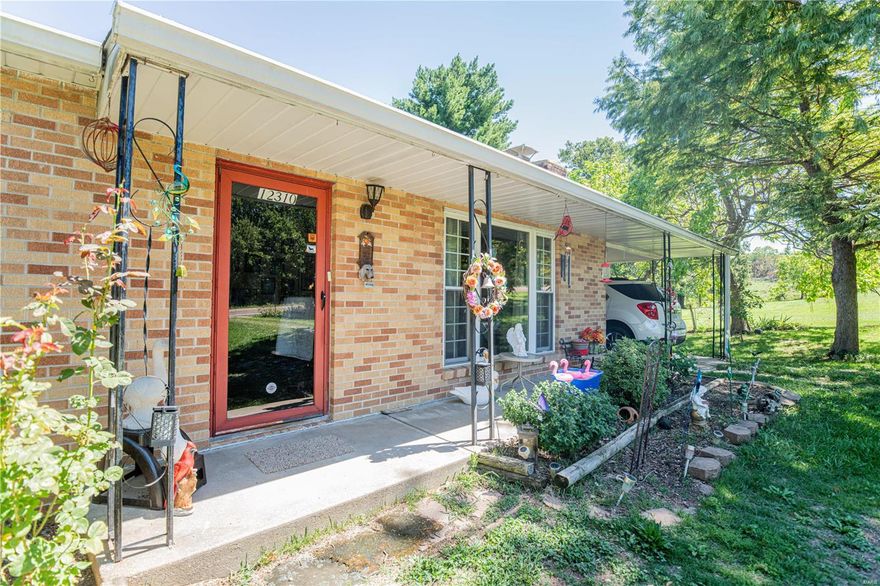 It's the property most everyone is looking for -- just under 3 Acres, Ranch Style home with a walkout basement, fencing for horses, small barn and a circle drive for plenty of parking offstreet. The home has original hardwood floors, a bright living room w/ big picture window and gas fireplace. The kitchen has it's original wood cabinets in great shape and a nice sized eat-in dining room that walks out to the carport or down to the unfinished basement w/ tuck under garage. There's also a pond and fencing for your furry friends. Call to see today!