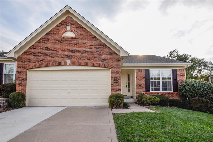 $10,000 Price Reduction for a Quick Sale! Spacious great room ranch in upscale neighborhood! Open floor plan, gleaming wood floors & soaring ceilings create a light & airy atmosphere. Inviting covered porch entrance leads to gracious hardwood foyer, formal dining room & vaulted great room highlighted by marble fireplace. Bright open kitchen featuring custom 42” cabinetry & quality appliances adjoins light-filled breakfast room with sliding glass door that opens to deck with view of woods. Fabulous master bedroom suite with walk-in closet & ensuite bath plus large 2nd bedroom, hall full bath & convenient laundry complete the main floor living quarters. Open staircase to professionally finished walk-out Lower Level with huge recreation room, 3nd bedroom & full bath. Finished 2 car garage. Nest Thermostat and Smoke Alarm. New Roof, October 2016!!! Situated on a private end lot backing to woods. Convenient location just minutes from shopping & restaurants with easy access to Hwy 40. Location: End Unit, Ground Level