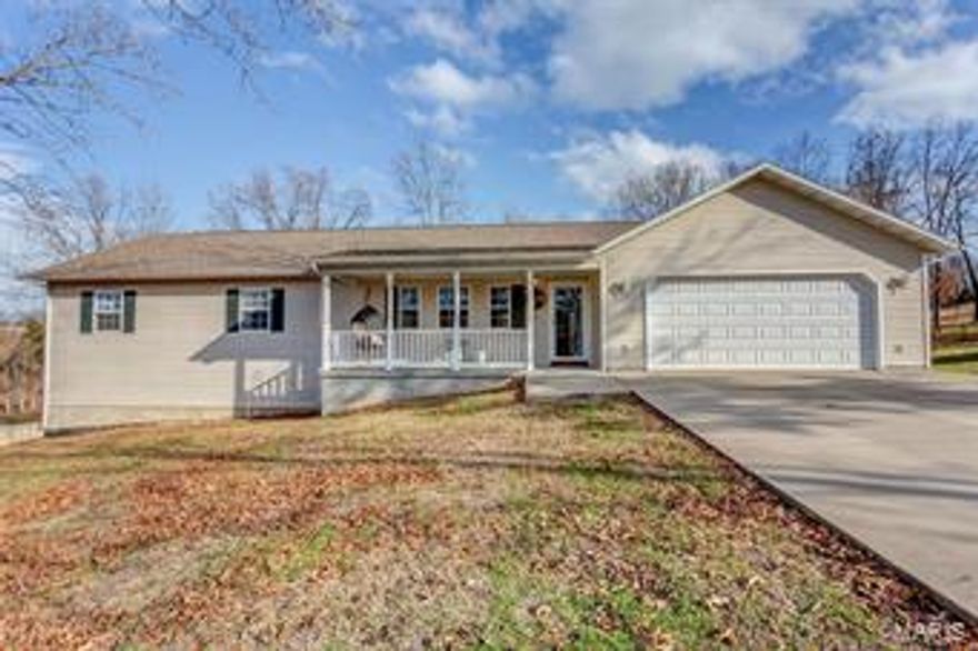 This remarkable Ranch Style homes sitting over an Acre just minutes from FLW!!! With a total of 4 bedroom and 3 bathrooms this home has so much room! The main level of the home has an open floor plan! The kitchen is huge with lots of cabinets, center island, breakfast bar, custom tile backsplash, and stainless steel appliances. The dining room sits right off the kitchen! In between you have access to the back deck over looking your fenced yard! Updated flooring throughout the main level of the home! The HUge MAster bedroom has his and her closets! The master suite has a double vanity and jetted tub! The is also 2 more guest bedrooms on the main level! Downstairs you have a whole other suite! There is a bedroom (no window), walk in closets, wet bar, bathroom, and family room area, from which you can walk out from! Come out and view this wonderful home!