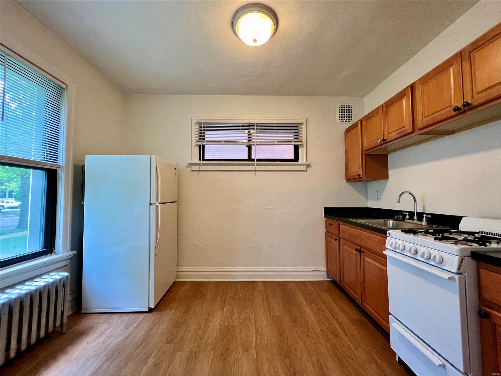 Laclede Ave & Forest Park Boule - Residential Income