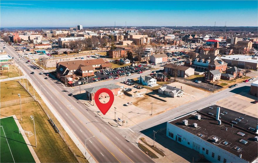 This prime commercial location receives phenomenal high traffic exposure and offers a large 1.037 m/l acre lot zoned C-2.  It sits just down from the busiest intersection in Rolla on Bishop Avenue and is located directly across from the MST Multipurpose building and playing fields.  This is one of the few commercial sites left available on the business loop in Rolla and has a traffic count of over 20,000 cars per day! Location: City, Corner Location, High Traffic, Hwy/Interstate Frntg