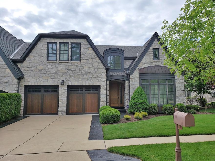 Elegance and class in this custom 1.5 story villa! Chesterfield's finest 24 hour gated community. This villa should be at the top of your list! Almost 6,000 sq ft of custom quality amenities. Elevator to all levels. Main floor features in the formal dining room, butler's pantry, great room office AND large enclosed porch! Hardwood floors. Kitchen amenities: Upgraded appliances (Thermador, Bosch, Subzero), gas cook top, granite counters. Master suite includes a separate dressing room and master bath w/marble counters & floors, Jacuzzi, custom built-ins. Two additional bedroom ensuites on the second floor! And a playroom/sitting room & plenty of storage. In the walk-out lower level you'll find a spacious recreation room with gas fireplace, exercise/hobby room, fourth bedroom, 1 1/2 baths, kitchen AND a second screened porch. Backs to trees! Privacy! 
convenient location and 24 our gated community! Location: End Unit