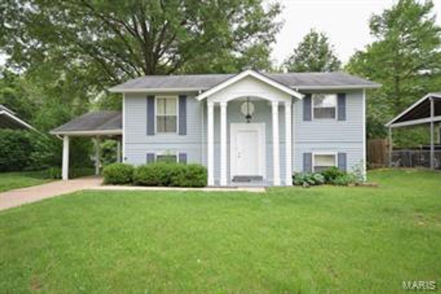 Wonderful value for the price!  Four bedroom two bath split with large back yard.  Updated kitchen with pantry, dishwasher, and mounted microwave.  Large living room and two bedrooms on the upper level.  Family room, some storage,  and bedrooms three and four on the lower level.   Backyard backs to trees and home has a deck.  Front of the house has been freshly painted and is quite striking from the street.  The location offers ideal access to the Page Extension as well as various amenities.  Seller would like about a 45 day closing if possible.