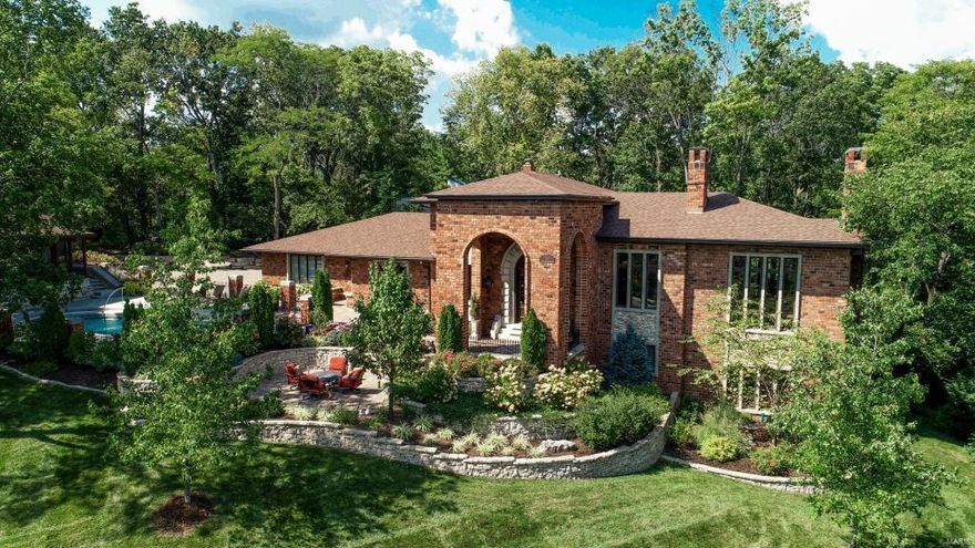 Spectacular Custom Home, 5 Bd, 5.5 Bth, 7700+ Sqft of living space, 1.16 acre lot – Top Rated Kirkwood School District! Main Floor features an elegant formal Dining Rm, beautiful Study/Office, light-filled Great Rm, gourmet Kitchen, adjoining Breakfast Rm, lovely Powder Rm & Laundry Rm. You’ll also find a Master Suite designed to perfection with a beautiful Sitting Rm, luxury Bth & custom organized walk-in closet. Walk up the incredible handcrafted staircase to find 2 spacious Bd with a walk-in closet & a large updated Jack & Jill Bth. Incredible professionally finished, W/O LL showcases a “Cheers” like custom bar, poker area, fantastic Family Room, home Theatre area, the 4th & 5th legal Bd & 2 updated full Bth. Highlights: 10’+ ceilings, hardwood floors, extensive millwork/moldings, solid wood doors, newer zoned high-efficient HVAC, alarm & irrigation systems, extensive landscaping, outdoor lighting, saltwater pool, pool house dating back to 1859 & an impressive 4-car garage. Additional Rooms: Mud Room