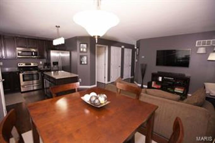 Here is your chance to have a nearly new home with incredible updates and low maintenance living all in one. Updates include newer hard wood flooring, hard surface counter tops, and stainless steel appliances. There are three large bedrooms upstairs with a full bath and loft area. There is a large unfinished basement for storage that also includes a washer and dryer for tenant use. There is a full sized attached garage with garage door opener. The back yard is full of green space and backs to trees. This townhome is only a few blocks from the subdivision playground. Included in the lease rate is exterior maintenance, lawn maintenance, and landscaping. The location offers extremely quick access to Hwy 370 and downtown St. Charles. This home is close to work, play, and entertainment. St. Charles offers many parks, bike trails, and seasonal events just down the street.