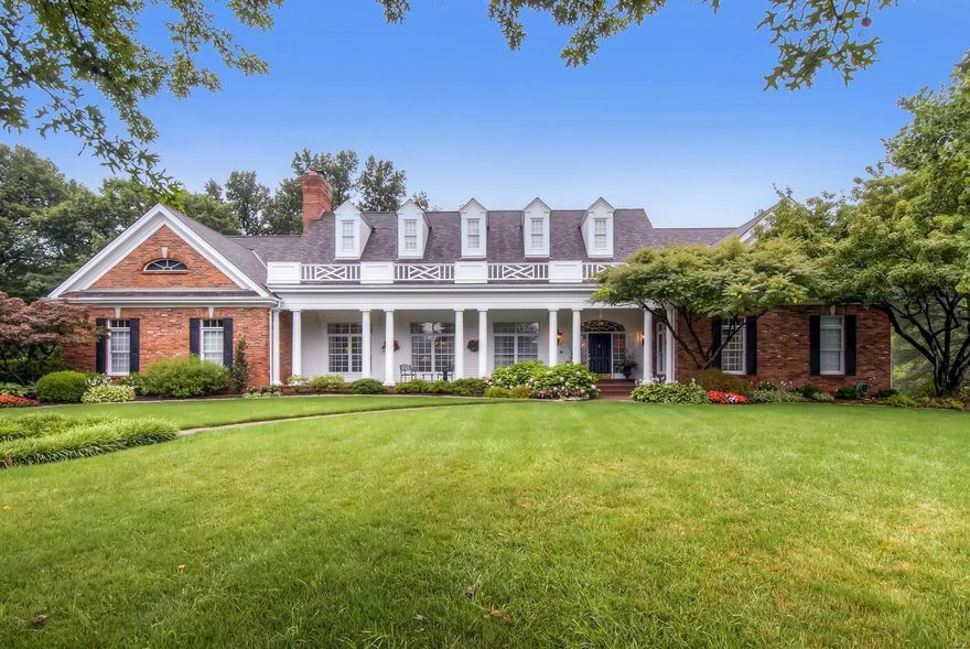 Nestled on a prized lot in the gated community of Manderleigh Estates, this classic colonial has been professionally renovated & decorated by one of STL's most renowned designers, delivering an elegant yet understated vibe! This home lives & feels like a ranch yet is comprised of fabulous living spaces on 2 tastefully renovated levels w over 3,700 SF on main. Do not be fooled; this reverse 2-story has a LL that lives as does a 2nd level in a traditional 2-story with so much more, supplying over 7,200 sqft of TLA. Unmatched by any hearth rm in contention, this elegant space defines the heart of the home. Main floor master wing which includes a cozy office/den fit for a king & queen. Four add'l bedrooms/2 full baths w/ an unexpected LL embellished with every amenity. Pool/outdoor covered family rm and an oversized 3-car garage w/ extra space for the sportsmen or artisan. A private 1-acre property unlike any other in Frontenac!