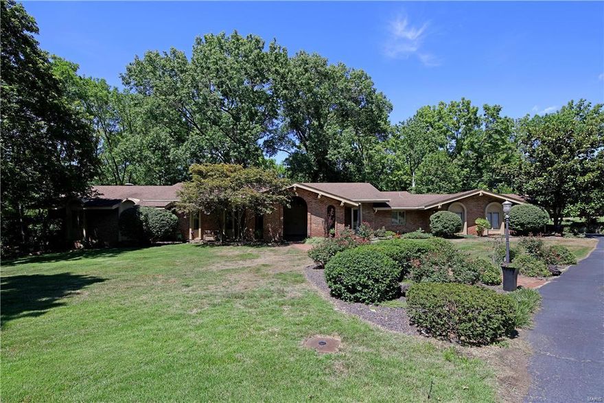 PRICED TO SELL!!!!! This 4 bedroom 3 1/2 bath one story home is situated on a beautiful and very private 1.8 acre lot in the heart of Ladue. The open and spacious floor plan features an inviting entry, step down living room with built in bookcases, formal dining room, spectacular great room with fireplace, updated kitchen with separate breakfast room and first floor laundry room. There are four generously sized bedrooms including the master suite with two walk in closets and large master bath. The lower level offers a family room with fireplace and bar area and has french doors to the pool. Additionally there is a large rec room, another bath, a bedroom and exceptional storage space. The secluded pool area offers a lovely retreat. This one of a kind house has so much to offer! Additional Rooms: Mud Room