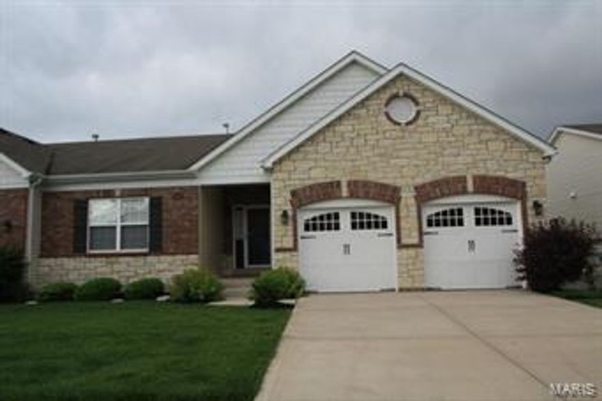 Montclair ranch plan 1734 sq.ft. 2 Bedroom 2 Bath, o/s garage w/ storage shelves. Elegant Brick and Stone Exterior. Vaulted Ceilings in Foyer, Great Room, Dining Room, Kitchen & Breakfast Room. Great room w/ Gas Direct Vented Fireplace, Marble Surround, and dining room. A 12 x 6 Main Floor Laundry off garage. Lg Mstr suite with 9 x 5 walk in closet, Luxury Master Bath w/ Double Sink, Brushed Nickel fixtures, Cultured Marble Tub, Separate Shower & Ceramic Tile Flooring. Kitchen and breakfast room w/ Estate Strip Hardwood Flooring, Upgrade 42" upper maple cabinets, Recessed Lighting and Quartz Countertops. Garage w/ plenty of shelving & Coach Lights. Lower level unfinished w/75 Gallon Water Heater, Look-Out Lower Level w/ Egress Windows, 9 ft Pour and Full Bath Rough-In. Large Deck off the Breakfast Room with Stairs to the backyard. Exceptional Value in Chesterfield near Creve Coeur Park. Location: End Unit, Ground Level