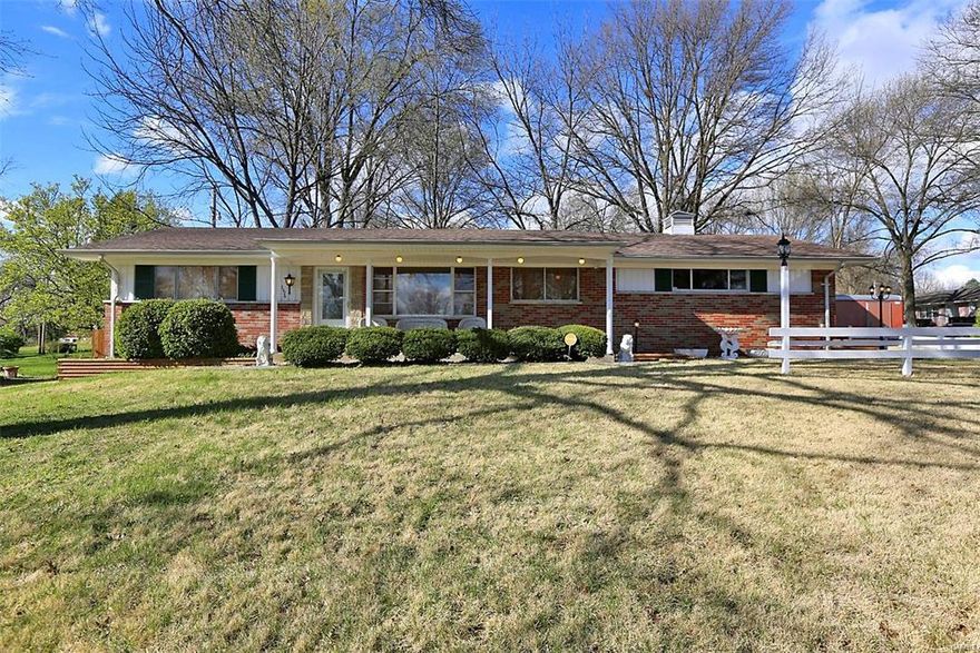 WOW! Great Curb Appeal on this brick ranch home. Gleaming hardwood flooring in living room ,dining room, hall and bedrooms. Family room has a sliding door out to nice yard with hot tub. Bedrooms are spacious and the baths are updated. The lower level features a family room and a den/office and a large cedar closet. Newer plumbing includes main stack and kitchen stack. Updated electric panel.  The lower level is a real plus for this home. Oversized side entry garage has a work shop/storage area. Roof is 4 years old. Shows great! Move in ready.